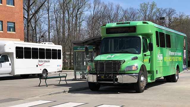 George Mason University gree shuttle bus operated by Reston Limousine