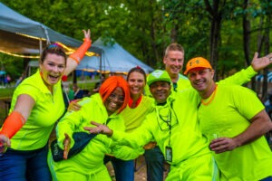 group summer concert transportation, A group of friends in neon green and orange